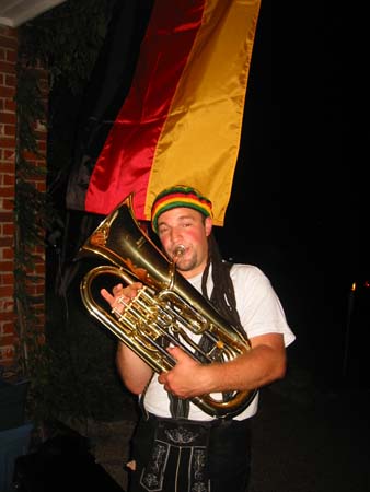 Rastaman at an american Oktoberfestparty.